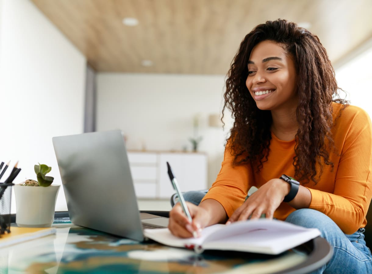 woman on laptop learning from home