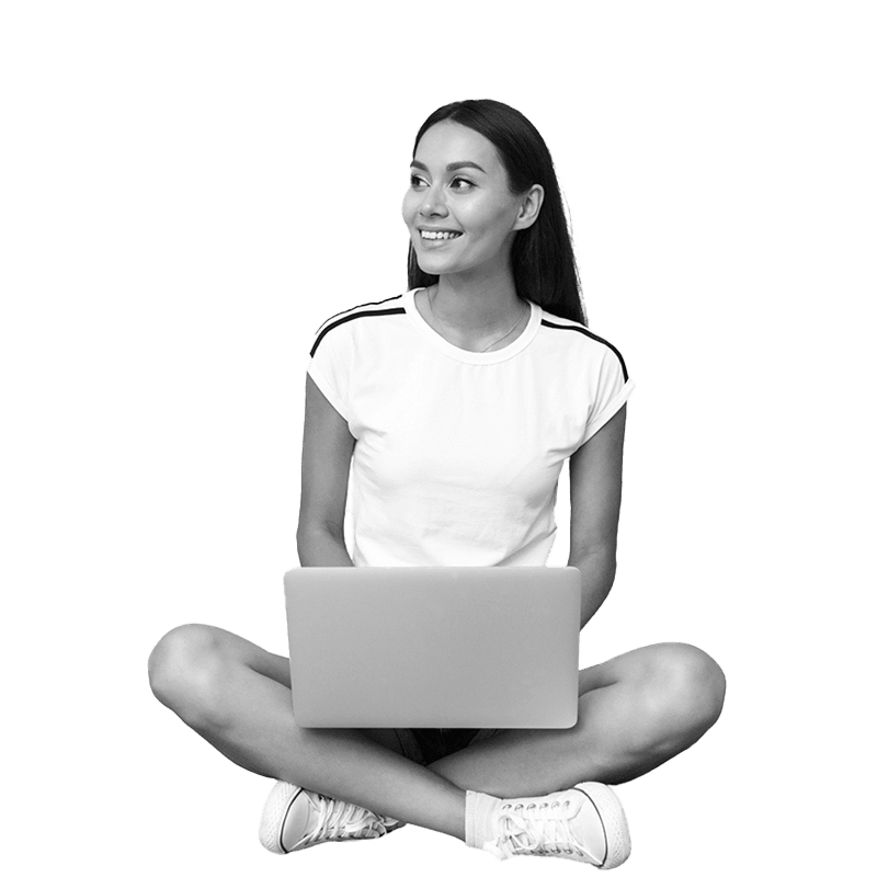 Nail tech learner studying on laptop